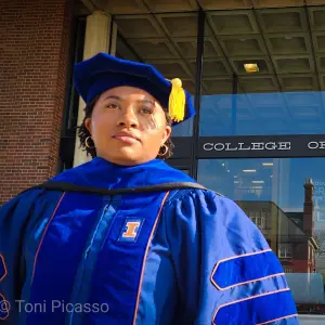 Destiny Williams-Dobosz in front of the Education Building